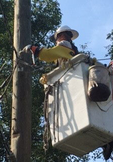 valient-member-working-on-pole